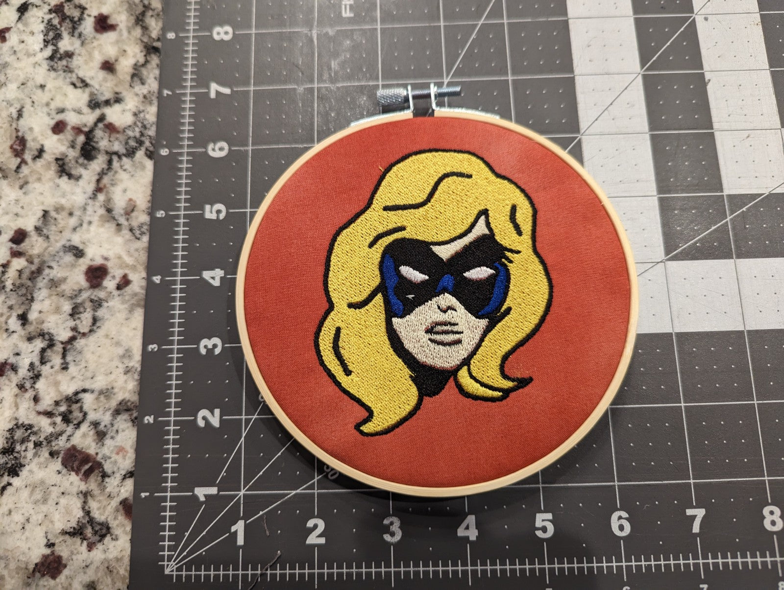 Ms. Superhero Face Wall Hanger