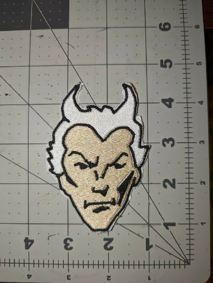 Mercury Face Iron On Patch