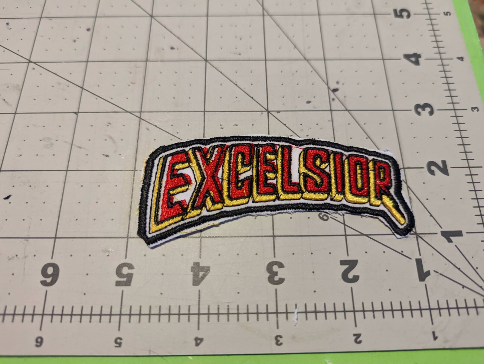 Excelsior Swoop Iron On Patch