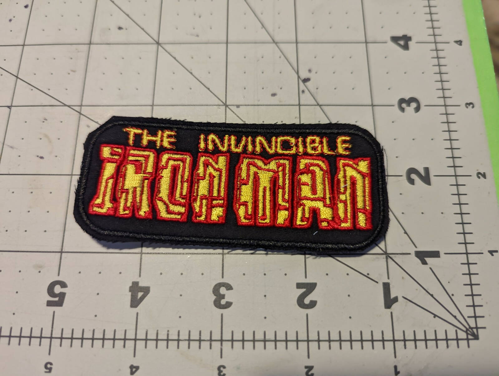 Invincible Steel Guy Logo Iron On Patch