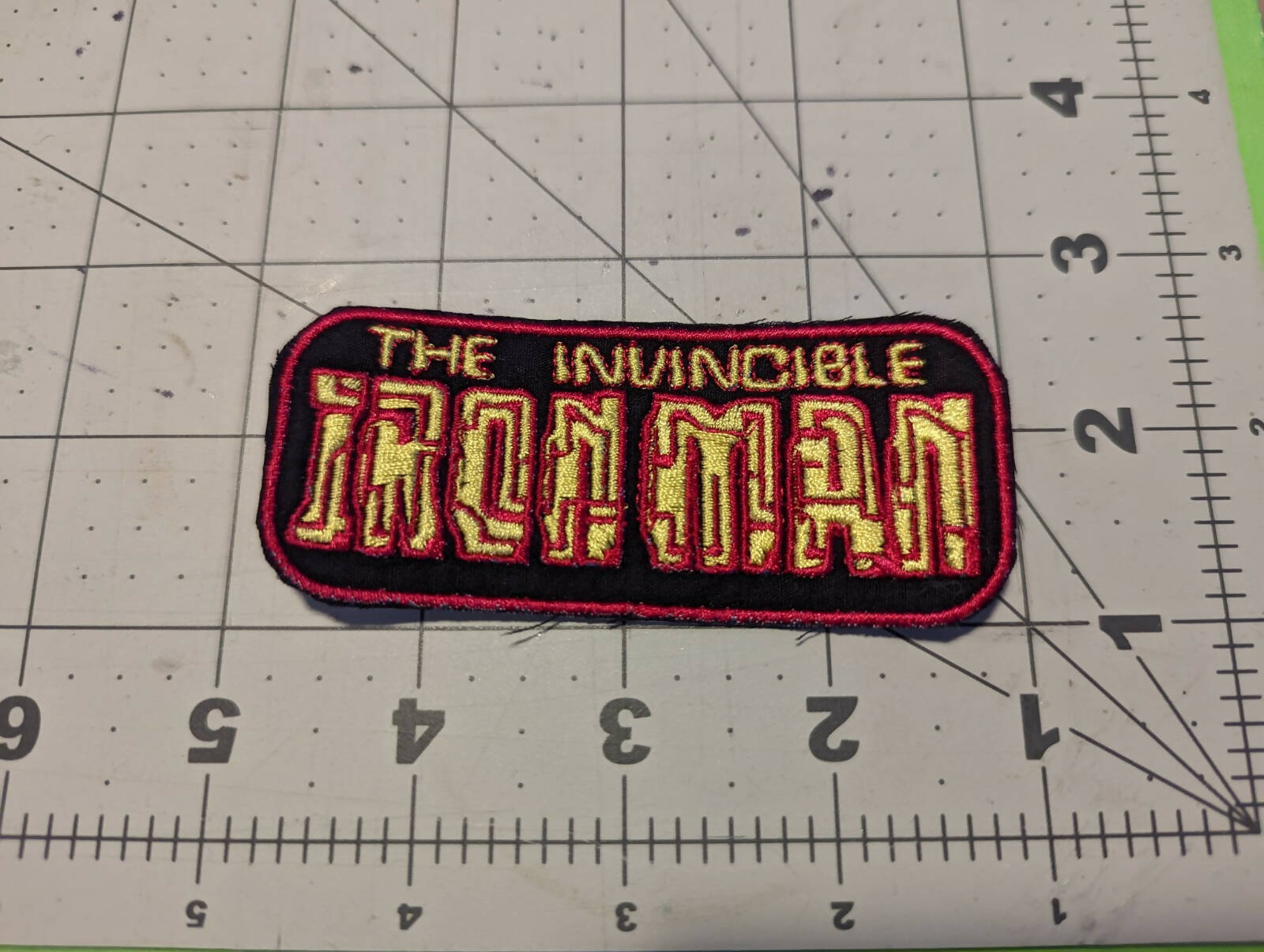 Invincible Steel Guy Logo Iron On Patch