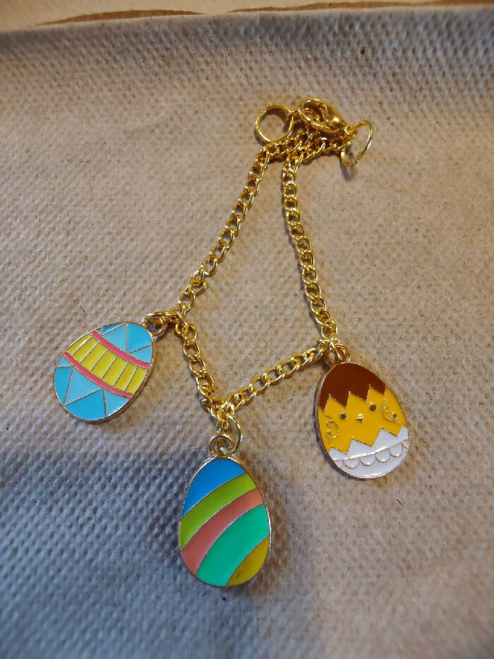 EB #12 Gold tone 7 inch w/ Eggs Charms