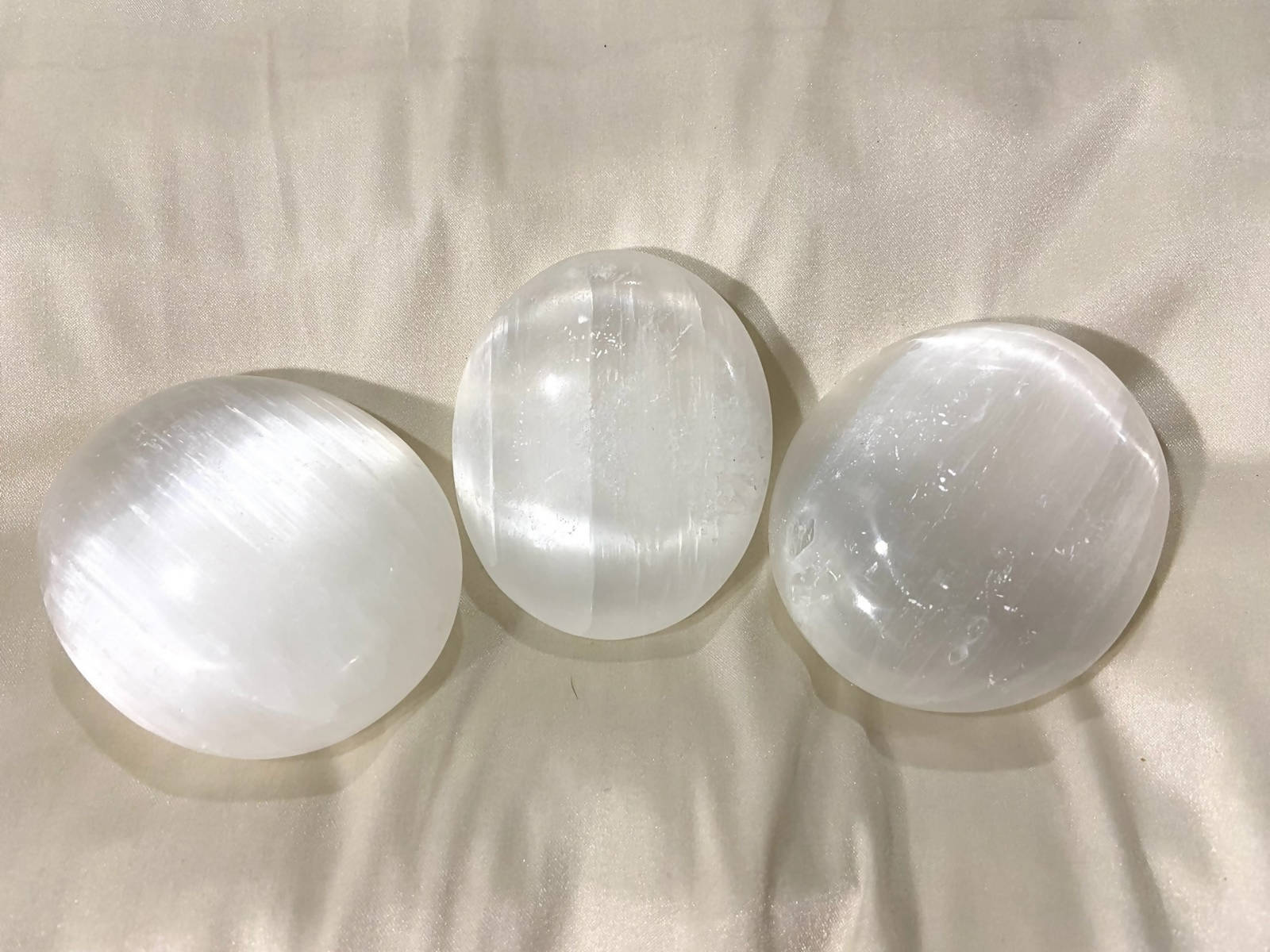 Selenite palm stones