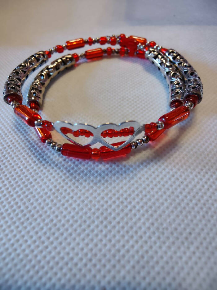 B #68 Memory Wire Double Stainless Steel Hearts, Red Glass Beads, 4 Silver tone Tube Filigrees.