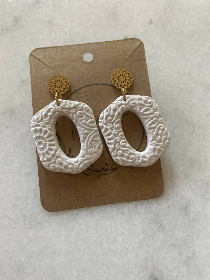 White patterned hexagon/oval dangles